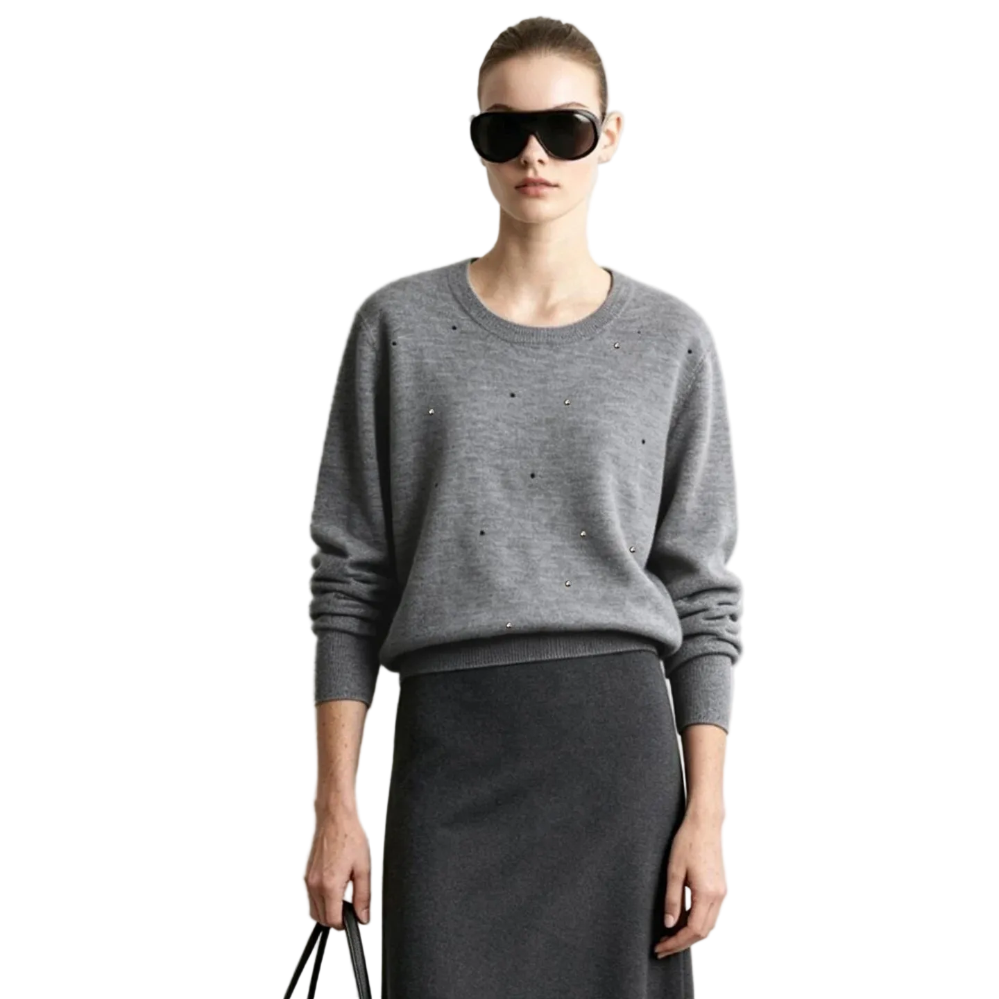 A model wearing an AMII gray knit crewneck sweater with small rhinestone embellishments, paired with a dark gray skirt and black sunglasses, against a plain white background.