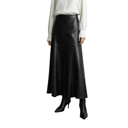 A model wearing an AMII black faux leather midi skirt, paired with a white blouse and black pointed-toe ankle boots, standing against a light gray studio wall.