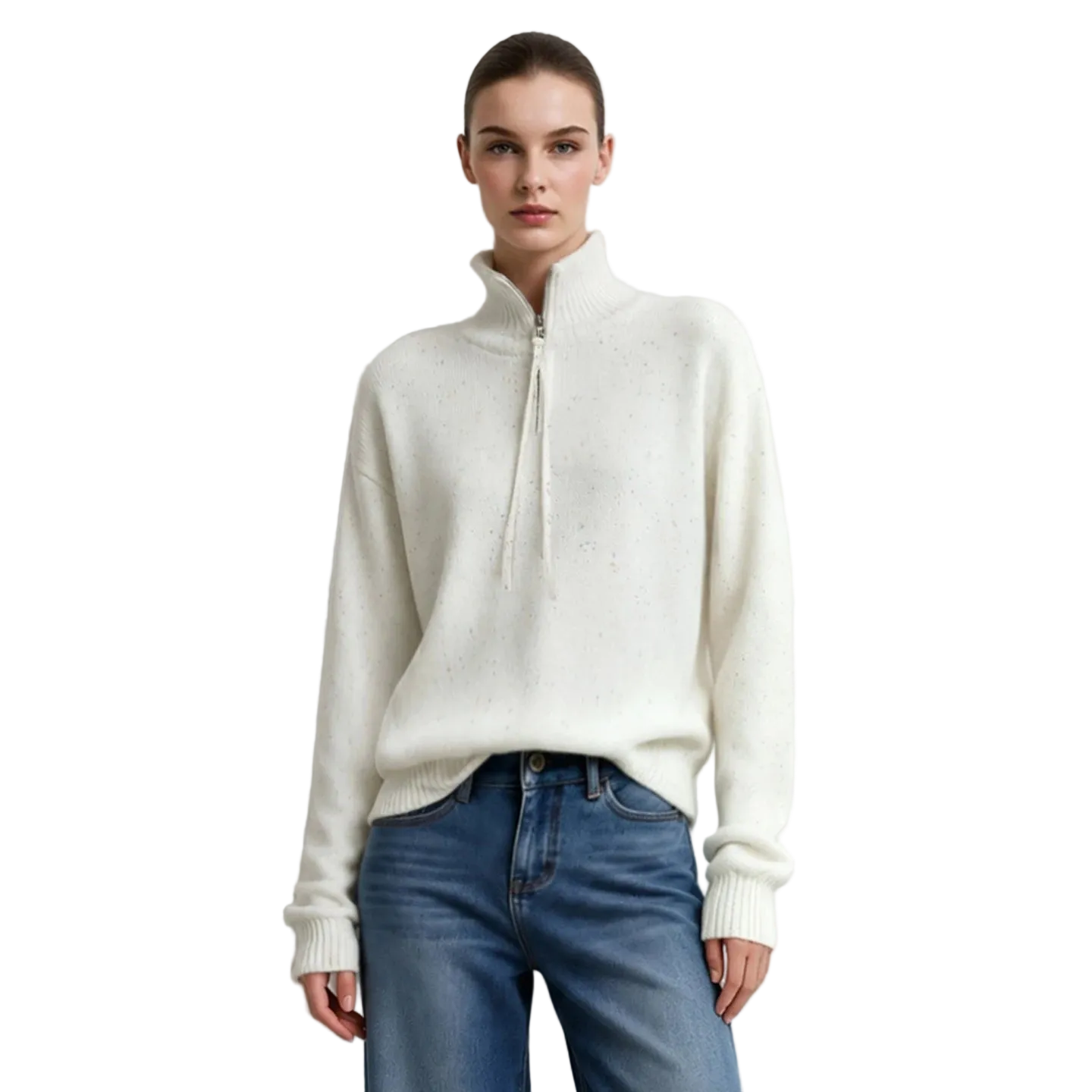 A model wearing an AMII cream-colored half-zip mock neck sweater and blue jeans, standing against a plain light gray wall.