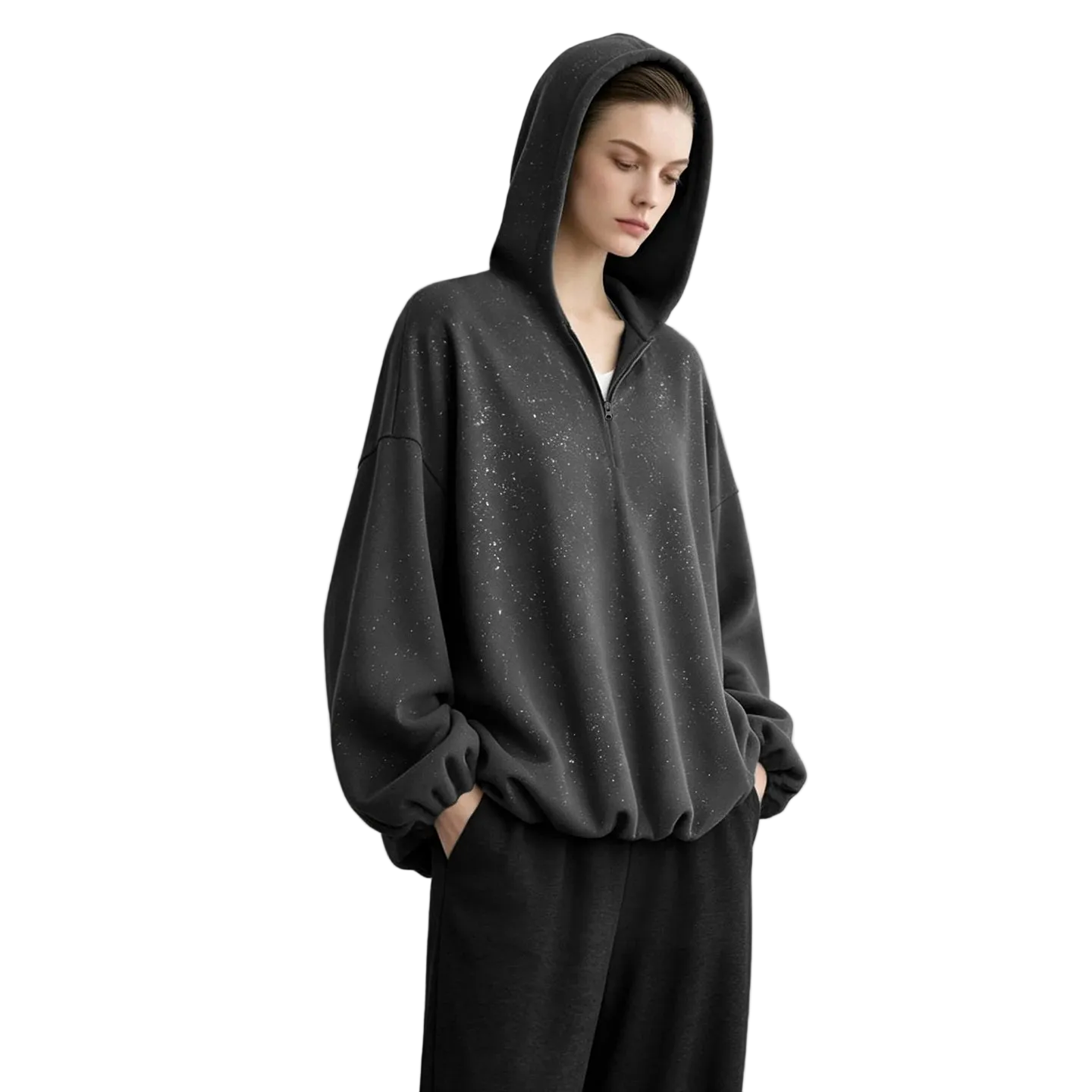 A model wearing a dark gray half-zip hoodie with subtle silver speckles and black sweatpants, set against a light gray background with the brand name AMII in the top left corner.